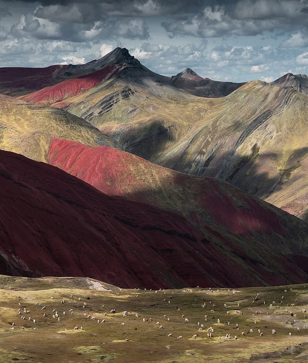 The Andes mountains rising into cloud, Peru